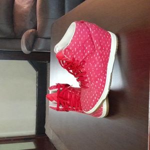 Nike hidden heel shoes. Red and white in excellent used shoes